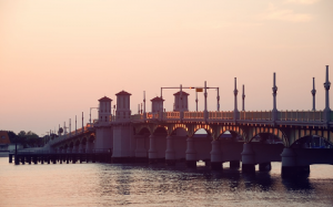 Image is of a bridge at dusk in St. Augustine.