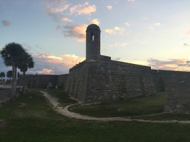 Image of Castillo de San Marcos stone tower and walls at sunset