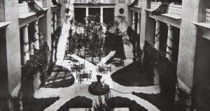 Black and white photo of large court yard inside Hotel Alcazar, now called the Lightner Museum.