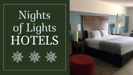 Image contains text that reads "St. Augustine Nights of Lights" as well as a spacious hotel room with a bed and end table.