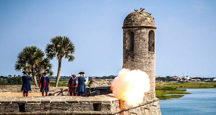 image of re-enactors firing cannon at the Castillo de San Marcos during Historic Weapons Demonstration